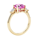 3 stone round diamond ring in classic 14k yellow gold setting.