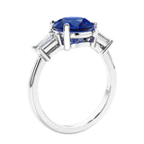 Round diamond engagement ring with side stones, ideal for those wanting affordable engagement rings that shine.