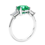 Round diamond engagement ring with side stones, ideal for those wanting affordable engagement rings that shine.