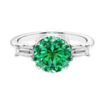Lab diamond engagement ring in 14k white gold with round colombian emerald center and two matching diamonds for timeless beauty.