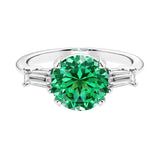 Lab diamond engagement ring in 14k white gold with round colombian emerald center and two matching diamonds for timeless beauty.