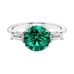 Lab diamond engagement ring in 14k white gold with round emerald center and two matching diamonds for timeless beauty.