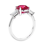Round diamond engagement ring with side stones, ideal for those wanting affordable engagement rings that shine.