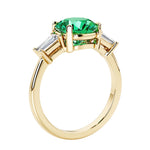 Round cut diamond ring in a 3 stone setting, one of our most loved female engagement rings.