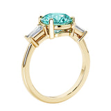 Round cut diamond ring in a 3 stone setting, one of our most loved female engagement rings.