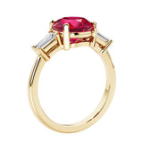 Round cut diamond ring in a 3 stone setting, one of our most loved female engagement rings.