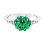 Custom colombian emerald round cut 3 stone engagement ring in 14k gold, perfect for modern brides.