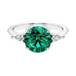 Custom emerald round cut 3 stone engagement ring in 14k gold, perfect for modern brides.