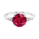 Custom red ruby round cut 3 stone engagement ring in 14k gold, perfect for modern brides.
