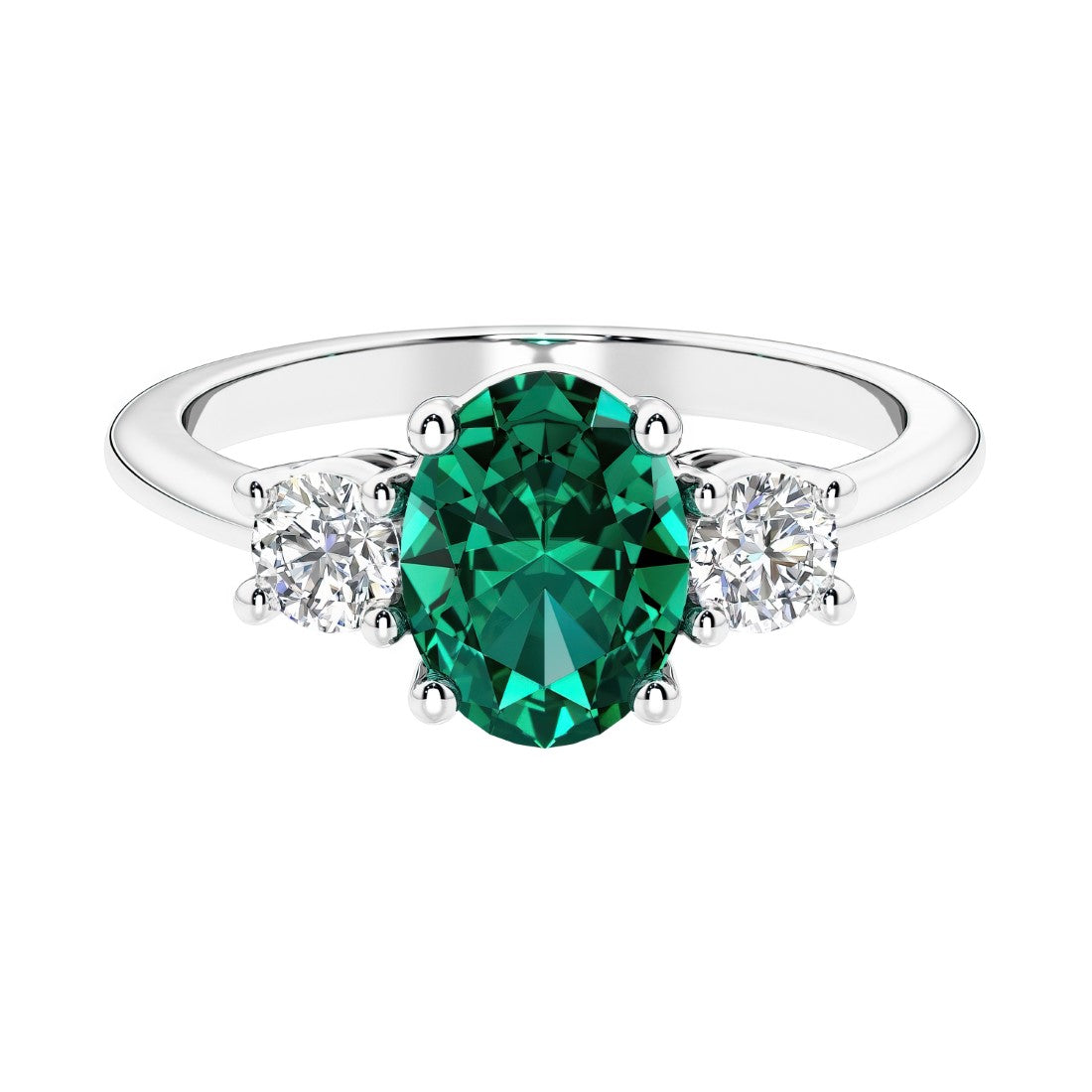 Three stone oval cut emerald and diamond ring in classic design.