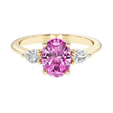 Oval and pear shape 3 stone engagement ring with pink sapphire and brilliant diamond side stones.