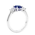 Unique engagement ring with oval gemstone and brilliant diamonds