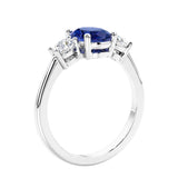 Unique engagement ring with oval gemstone and brilliant diamonds