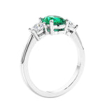 Unique engagement ring with oval gemstone and brilliant diamonds