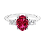 3 stone oval engagement ring with elegant proportions.