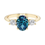 Oval 3 stone engagement ring with real alexandrite and brilliant diamond side stones.