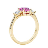3 stone oval engagement ring with elegant proportions with pink gemstone and diamond side stones.