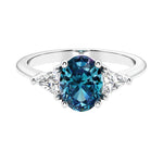 3 stone oval engagement ring with elegant proportions 14k white gold.