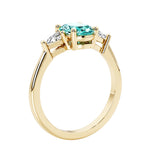 Oval 3 stone engagement ring with gemstone brilliant diamond side stones.