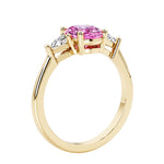 Oval 3 stone engagement ring with gemstone brilliant diamond side stones.
