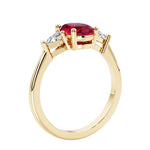 Oval 3 stone engagement ring with gemstone brilliant diamond side stones.