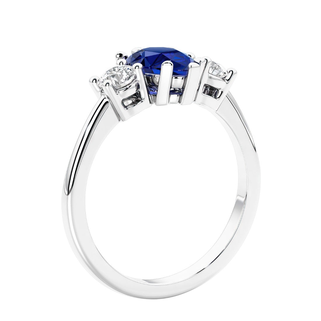 3 stone diamond engagement ring with pear shaped center in white gold featuring blue sapphire.