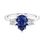 Blue Sapphire 3 stone pear diamond ring set in a delicate band.
