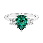 Green Emerald 3 stone pear diamond ring set in a delicate band.