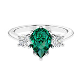 Green Emerald 3 stone pear diamond ring set in a delicate band.