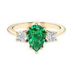 Colombian Green Emerald pear shaped 3 stone engagement ring with elegant diamond side stones.