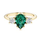 Green Emerald pear shaped 3 stone engagement ring with elegant diamond side stones.