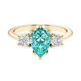 Paraiba Green Tourmaline pear shaped 3 stone engagement ring with elegant diamond side stones.