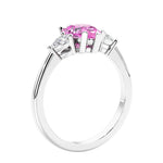 3 stone diamond engagement ring with pear shaped center in white gold featuring Pink Sapphire.