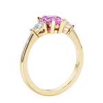 Pink Sapphire three stone pear shaped engagement ring with classic styling.