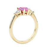 Pink Sapphire three stone pear shaped engagement ring with classic styling.