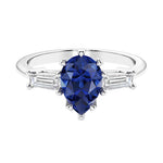 Blue Gemstone 3 stone pear diamond ring set in a delicate band.