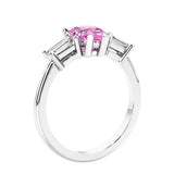 3 stone diamond engagement ring with pear shaped center in white gold featuring Pink Gemstone.