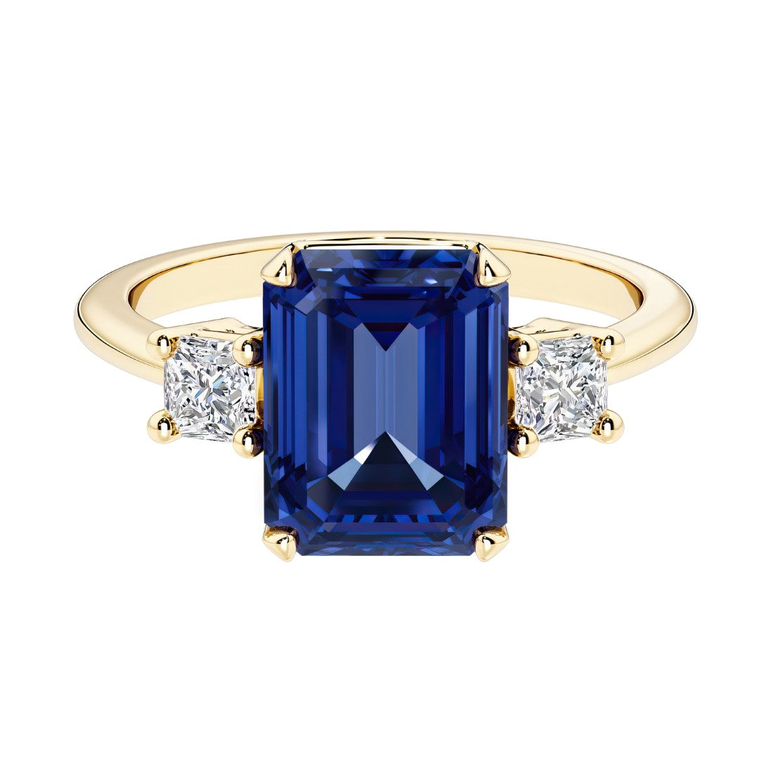 Emerald cut 3 stone engagement ring with blue gemstone and diamond accents.