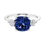 Cushion shaped engagement ring with brilliant diamonds.