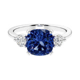 Cushion shaped engagement ring with brilliant diamonds.