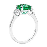 Cushion cut diamond ring as a unique engagement ring featuring three stone design.