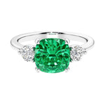Cushion shaped engagement ring with brilliant diamonds.