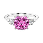 Cushion shaped engagement ring with brilliant diamonds.