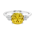 Cushion shaped engagement ring with brilliant diamonds.