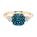 Cushion cut 3 stone engagement ring with soft corners and vintage charm.