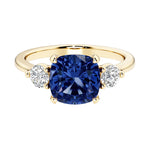 Cushion cut 3 stone engagement ring with soft corners and vintage charm.