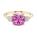 Cushion cut 3 stone engagement ring with soft corners and vintage charm.