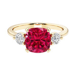Cushion cut 3 stone engagement ring with soft corners and vintage charm.