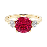 Cushion cut 3 stone engagement ring with soft corners and vintage charm.