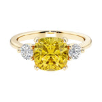 Cushion cut 3 stone engagement ring with soft corners and vintage charm.